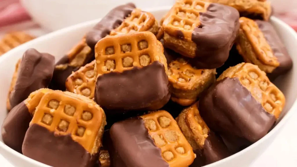 Peanut butter pretzels, sweet and salty snack, homemade peanut butter pretzels, peanut butter filling, pretzel recipe, protein snack, healthy snack alternative, peanut butter pretzel pros and cons, chocolate-coated pretzels